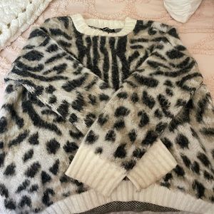 Women’s cheetah print sweater